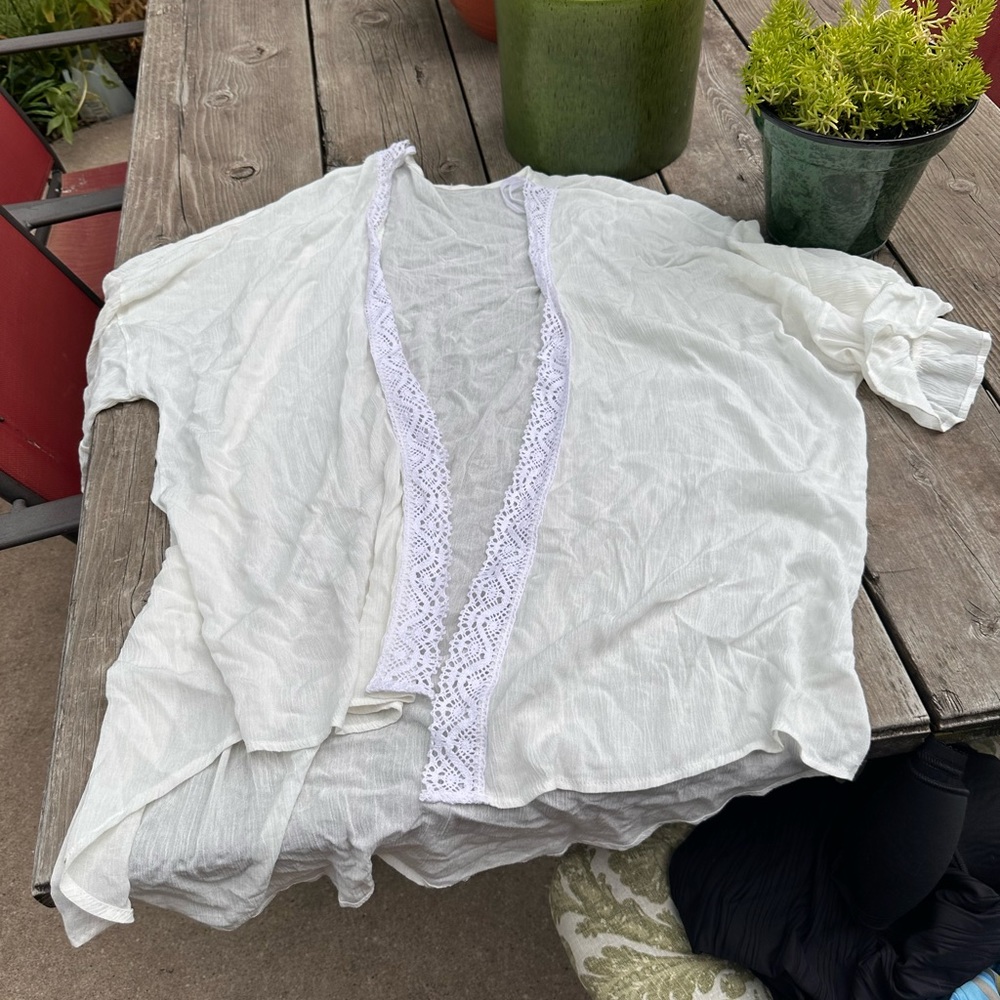 White flowing cover up or cardigan